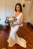 I returned my dress from a well-known store to wear this dress on my wedding. It was absolutely stunning and exactly what I wanted. I added a belt from Amazon but it was just as pretty without it. I'm bigger in the bust area and it was very supportive and comfortable. - Bryanna R.