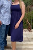 This dress fits perfectly. It has some stretch in the chest and stomach area. The shoulder straps tie so you can adjust them as you need. - Aimee F.