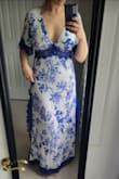 I got this dress for a wedding in the French Riviera and it couldn't be more perfect. I initially got a large and then lost weight- inCREDible customer service allowed me to exchange for a medium which is SPOT on in sizing. I used boob tape to hold my girls up; after breastfeeding I'm no longer perky and this all worked perfectly together. I feel gorgeous. Buy this dress. - Casey S.