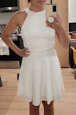 This dress was super comfy! The material was thick enough where I didn't have to worry about it being see-through and I also could wear it without a bra. However, I wish I had sized down to an XS - the small technically fit but the waist of the dress did not hit in my natural waistline (the dress was too long in the torso for me) which led it to feel a bit long and less of a flirty, cute dress. I won't be wearing this :( - Valerie C.