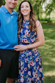 Fit well, flattering. Comfortable dress overall. Flowey on the bottom. Roomier in the hips but has a comfortable elastic band at the waist. I ordered a small and would order that size again. - Nicholee R.