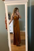 Very cute and high-quality fabric. I had to adjust the top constantly because it shows your bust /bra. I used fashion tape but it kept falling so that was stressful. Overall I loved it, but need to find a better solution for the top if I wear it again. - Elizabeth R.