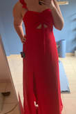 This is an almost surprisingly flattering dress. The waist fit perfectly, true to size. Great color and the construction of the top is very cute. It worked well for my pear shape though a bit long, I had to have it hemmed and I'm pretty tall. Can definitely be dressed up for an event or down for every day. - Anna T.