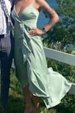 Wore this to a wedding and got so many compliments! Runs a little large (I'm between a M and L)  and shows some serious cleavage. Still love it! - Anna B.