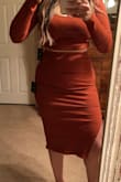 It's a beautiful rust color! Loved the fabric, stretchy but not see through at all! Accentuates your curves greatly. Can't wait to wear it and also mix and match these beautiful pieces! - Maira M.