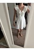 It fit okay but the ruffles feel really flappy and larger than they look in the picture so returned it - Rachel B.