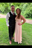 The dress fit true to size in my opinion. It was comfortable and tight enough across my chest to not have to wear a bra. I thought the quality and price were great! I did have to have 2-3" taken off the bottom even with 4" heels on and I am 5'6". - Dallas A.