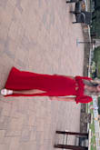 I got this dress in red and it's ABSOLUTELY GORGEOUS! It fits perfectly. Flowy and comfortable. I got so many compliments. Please make it in other colors! - Meagan H.