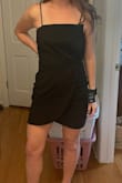 Such a flattering and unique cut on an otherwise simple LBD! - Colleen M.