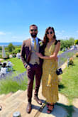 Purchased this dress for a wedding in Italy and it was perfect!!!! It was a little loose on the side ( I have a small chest), but I wouldn't size down. I wanted a dress that was elegant/graceful and this dress fits the bill. The yellow is even prettier in person! Accessories also make a outfit so black suede heels looked best. - Andrea V.