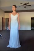 Looking for a simpler dress design for July wedding and this one looked less like a slip than some other ones. Reading reviews was INCREDIBLY helpful so thank you to those that do. Ordered XS because of my flat chest and it fits perfectly. I am kind of sucking it in for the side view so I plan to get under garments that will flatten my stomach. When I tried this on after a big meal it does make you look pregnant. Absolutely love the bead and the delicate shimmer. - Emily M.