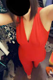 Purchased this jumpsuit for a birthday celebration, and could not be more pleased. It hugged in all the right places, giving a very flattering fit! The bust area was easy to wear without a bra, and I didn't feel exposed doing so. The only downside, it was very long, so I had to have it hemmed. That just comes with being 5'1". Would recommend to anyone!! - Jessica D.