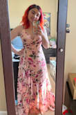 I needed to buy a floral dress for a bridal shower event and was so happy to find this one! I didn't have time to get any alterations done but thankfully this dress fit correctly in all the places that needed to. The only issue I had with this dress was that it was incredibly long and even my highest heels (platform wedges, guessing around 4-6 inches) did not make me tall enough (but just barely!). That being said, I think it would be a perfect fit for someone less vertically challenged than I. I definitely plan on seeing if I can get it hemmed as it is a beautiful dress and I look great in it! - Elizabeth S.