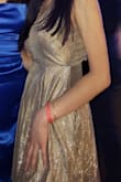 Wore it to formal and loved it! Very nice quality, but the color definitely is a bit different from advertised, - Lauren B.