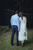 The lace overlay was just what I was looking for - something soft and feminine but not cheap looking. Worked out perfectly for our wedding pics and I loved the back. We had a casual wedding party after getting married during Covid and it was the perfect dress for our afternoon BBQ type of party. - Leandra W.