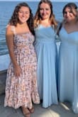 Bought this dress for a wedding. Being 5'0, I got about a foot altered off the bottom so that the dress wasn't floor length, but ankle length in heels. The fabric is lightweight and the tie straps are perfect so that we petite women can adjust the neckline and under the arms. It is a little tight, like other reviews said, in the bust area but I wouldn't size up. I look forward to wearing this dress again in the future! - Elizabeth B.