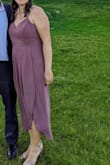 I have a larger chest so I had to go up to the XL, so I felt like the waist was a little too loose.
I loved how it looks and the color is lovely. The length is fun but great for a family wedding. I wore a strapless bra. - Dana V.