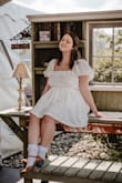 I wore this dress for my bridal tea party and felt like an absolute princess in it! I love the way it fit my curvier/bustier figure. Really nice material too. It also has a great twirl affect when you spin (: - Madison L.