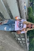 Super cute! I love that it's a crop top but still hides the tummy. It hit the waist of my jeans perfectly. I paired it with some ripped height-waisted mom jeans and I got a lot of compliments. Too cute to pass up! - Jasmine C.