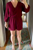 This wasn't super flattering on me. I needed a Large to accommodate my butt, but then the blousy top was too loose, and yes, there is a snap to hold the top closed, which was necessary. The shape was too square for me. Wearing a belt helped nip in the waist but made the shorts ride up too much. I did like the sleeves and felt this could be styled to look quite sophisticated. The open sleeves made getting in & out of this jumpsuit a little extra tricky. - Ja R.