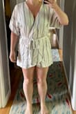 I needed a Large to accommodate my butt, but then the blousy top was too loose and kept falling truly open. There is no snap to hold the top closed, and it's a faux wrap so you can't pull the top any more snug. The shorts were too short for me to feel super comfortable, but the deal breaker was how you can see through the thin fabric of the back of the shorts. This piece feels like wearing a casual bathrobe, which would be comfy for around the house but not for me to wear out. - Ja R.