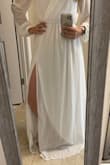 I love this gown! I've been looking for the perfect dress to wear to our rehearsal dinner for our December wedding, and I was having a hard time finding something wintery and elegant. This is exactly what I was looking for. The top is a little loose for someone like me who's small-chested, but the rest of the dress is great: flowy, flattering, and a little bit sexy too. It's a bit long, but a short heel will fix that! I love it and can't wait to wear for the wedding festivities. - Kayla J.
