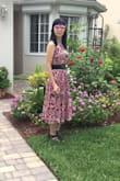 This is my first purchase from Lulus. I usually between size 0 and 2 or xs and s. I choose XS size because I read some of the reviews that this dress is a little large and they were right. The dress gives enough room for my waist because of the elastic. The top fits perfectly. This dress will turn the head of people that sees it. The color is pretty. I have several people [who] asked me who made the dress. Thank you Lulus for making a beautiful floral dress. I love a midi dress with a jewel or mock neck. I am not into a low-cut dress because I need to have a dress that can be worn appropriately everywhere. I am looking forward to the next spring when Lulus will make cap sleeve midi dresses or ruffle sleeve with a round or mock neck with beautiful floral color. - Jasmine C.