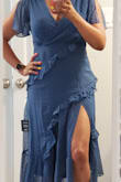Looks just like the picture. I'm generally a size 10 so I ordered an XL and I like the fit. Not too snug or loose. The only downside is there is no zipper so you have to put it over your head. Correction: Found the hidden zipper!
Love the slate color. Light material- comfortable.
Definitely a keeper!
The crop feature on this website would not allow me to fit the entire dress in pic. Not tall girl-friendly. - Mireille W.