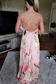 I bought this dress for a summer wedding and it is exactly what I was hoping for.  I ordered xs because after reading the reviews and I am glad I did.  The bust area is quite loose so I would have had gapping if I sized up.  The dress itself is very lovely, well made and beautiful material. - Dallas J.