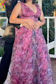 The dress is absolutely beautiful and the quality is great. I had a friend tailor it to close the cleavage a little bit but otherwise it was perfect! - Rebecca