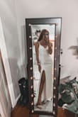 I'll be honest, buying a $100 wedding dress can be nerve-racking, but this will not disappoint. The sizing quiz they have is PERFECT. I would've ordered a medium if I didn't do the quiz and then it would've been too big. Super glad I listened to them. The material is really nice too. It is a little long, but wedding dresses are suppose to be longer so with a pair of heels it works! I wanted a causal form fitting dress and this was perfect! - Kathryn P.