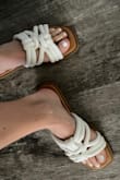 Length wise these shoes are tts for me but the straps are a little tight for my feet. Overall comfy and great quality. - Olivia W.