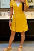 Love the color and style. Good quality. The top half is huge for smaller-chested women. I made it work with an undershirt, but it wasn't the most comfortable. The dress is held together with the ties and it loosens in certain positions (the front opens up). Maybe if I got a size small I could have wrapped it tighter and it wouldn't have loosened up so much. Still cute though. I'd wear it again to a short event. Definitely not an all-day thing. I'd be constantly readjusting. - Ann S.