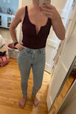 I bought this to wear for my engagement pictures. The straps are way too long and not adjustable, so I'm having them tailered, but overall it's a really cute top! This is a picture before adjustments. - Victoria B.