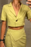 Because I'm a little tall, I was concerned that the gap between the top and skort was going to be greater, but I think this is the perfect amount of gapped. The shoulders are structured so lifting arms up any higher than the elbow will be a challenge. - Cecilia O.
