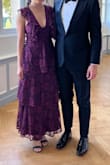 This dress is super comfortable and beautiful, but it was way too low cut on me. I got it tailored and it was perfect after that. It was great for traveling because it doesn't get any wrinkles. Got lots of compliments! - Tara D.
