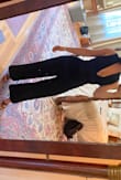 The material is lovely and doesn't wrinkle! It fit well and I didn't have to adjust it a lot all throughout the night. It was super long but that was the only alteration it needed. - Elaina D.