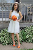 The dress fits very well. The fabric is high quality, is very beautiful and I was very satisfied with my purchase. I'm a short person and the length was perfect. I super recommend this dress and this company. Ahh, and it arrived very quickly. I wore this dress for my Wedding. - Milena L.
