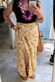 Wore it on my Hawaii Honeymoon around our resort and was so comfy, flowy, and cute. I'm only 5'1" so it was more like a maxi but perfect length. The extra layer in the front that you wraps around hides the belly and is flattering. - Stacy I.