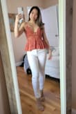 Absolutely gorgeous shirt. Fits extremely well and looks great! The ruffles needed some ironing when I received the shirt, but after that, it was perfect! Thought it would be a bit longer on me since my torso isn't super long, but it fit me just right. Highly recommend. - May C.
