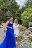 Great purchase!
I bought this for daughter's graduation. It fit perfectly, was not see through & as I am short it was a bit longer on me which is what I was hoping! Impressed with the quality & received lots of compliments. - Lisa C.