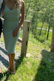 Good stretchy material. Love the color. Fitted past the knees but still easy to walk in. - Leah M.
