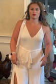 I got this to wear at my engagement party and it did not disappoint.  Beautiful fabric that is double and not see through. So important in s white jump suit. The fabric weight allowed it to hang perfectly. I did have to have it hemmed but it was so worth it. - Barbara G.