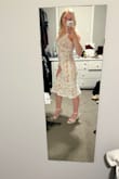I love the style of this trumpet dress. The intricate lace detailing is beautiful and very high quality! Sadly, the nude lining blended really well with my fair skin tone and made the dress look a bit too much like lingerie for my bridal shower. - Katie W.