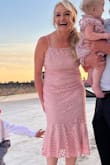 I bought this dress for my brothers wedding and it was perfect! I am between sizes so I took the fit test and it suggested a large. So glad I went with the large. It was the most comfortable dress I have worn. I received a ton of compliments. The dress is very flattering with the fit and flare type style and I loved  the adjustable straps. I chose not to wear a bra with the dress because I did not feel I needed one. I have two small kids and did not want a dress that would fall when carrying them. This dress did not fall and the top did not gap open when bending over to pick them up. Perfection! - Jackie B.