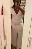 This dress is gorgeous it's just more like an actual bridal gown than I expected (too formal for my event). There's also a bit of a train. Great quality materials, beautiful fit. I usually wear a 2x and that's what I ordered! Chef's kiss. - Chelsea H.