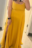 I ordered the large and exchanged it for an extra-large, both would have worked but the extra-large gave me more room in the bust. I wear a 36G and was able to wear this dress by just using tape to hold myself up as the dress offers little to no support. I loved the look and got many compliments!

The top of the dress did fall oddly, I was able to figure out how to make it look good but it doesn't lay flat and the right and left sides did not match when on. Looking at the photos you can hardly tell that there was more fabric on the one side. 

With me just being 5'2" I did need higher heals as the dress was too long, which I always expect when buying a floor-length dress. - Michaela F.
