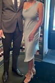 I loved this dress! The color was beautiful, the material was nice and easy to remove wrinkles with a portable hand steamer. Wore it to a summer wedding in NYC, it was extremely hot out and this dress held up! Also, there is a zipper on this dress. - Brandi D.