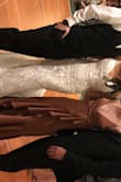 The dress is beautiful. It was a bit tight in the middle and the top was too loose. I ended up having to use dress tape that now will not come off the dress. Don't use dress tape! - Veronica W.