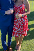 This dress was perfect to wear to a summer wedding. I love the design and the color. The material was decent, I had to steam it because it got pretty wrinkly but otherwise it was great. - Molly B.